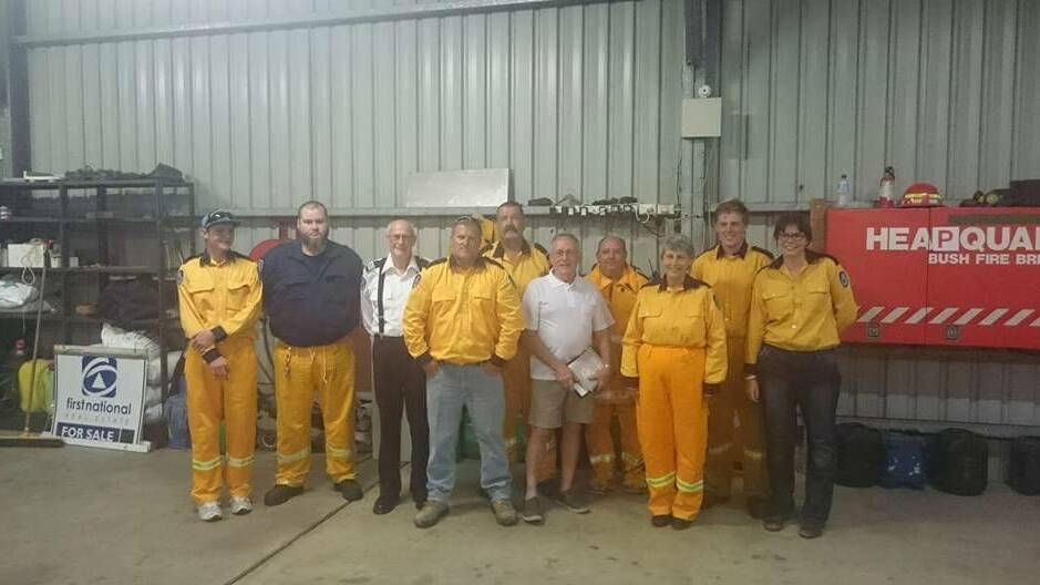 Members of Nabiac's Rural Fire Service in the shed, which turns 25 this month.