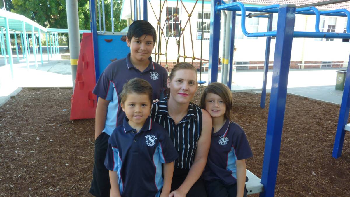 Proud mum, Cynthia Novac  with her three boys, Dante, year 6, Keanu, year 4, and Isaac, Kindergarten, who will all attend Forster Public School this year.