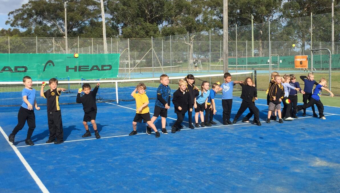 Australian tennis great, John Fitzgerald visited Tuncurry Public School recently, gifting brand new tennis racquets to first year primary students and hand out a few tennis tips.