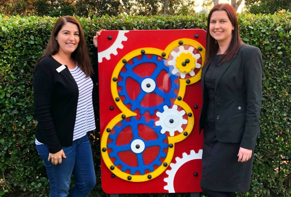 Retreat coordinator, Rhiannon Curtis showed Liz Algie from the Commonwealth Bank the new panels put in as a result of the donation. 