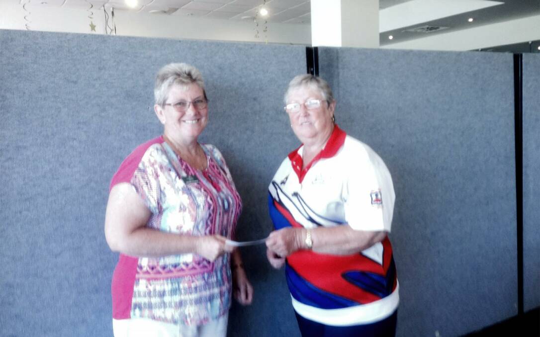 Diedre Stokes accepted a cheque for $2000 from Tuncurry Lady  Bowlers president, Judy  McLachlan.