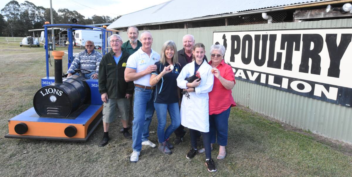 Getting ready: Hans Rooimans (Manning River Lions Club), Allan Poulton and Peter Kinsella (Manning Valley Woodworkers), Peter, Sandy, Barry, Katie and Aileen Tisdell. 