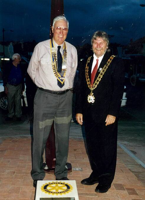 Bill and then Greater Taree City Council mayor Mick Tuck at the clock hand over.