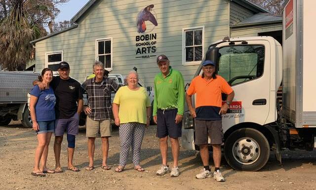 Luisa and Paul Calleja from Shell Cove, Rick (from Bobin), Cathy and Dene Herbert, and Dick Plummer (Shell Cove) with their deliver. 