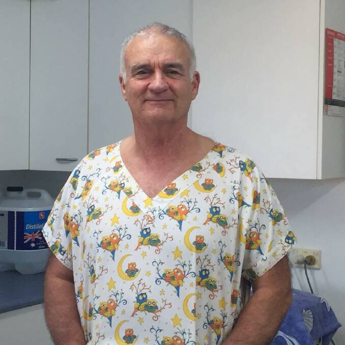 John in scrubs at Wingham and Valley Vets. Photo courtesy Wingham and Valley Vets.