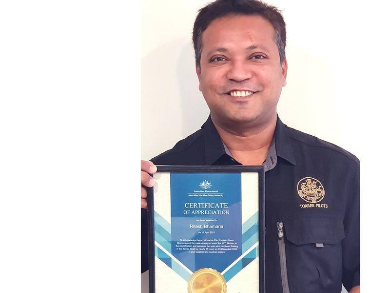 Oil tanker captain Ritesh Bhamaria has been recognised for rescuing two men in the Torres Strait.