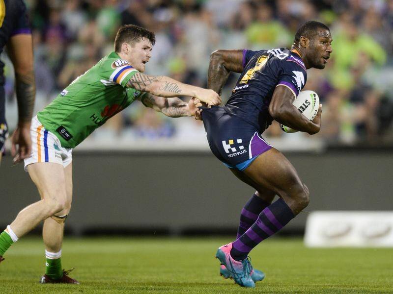 Suliasi Vunivalu (right) grabbed a fifth career hat-trick in Storm's NRL win over the Raiders.