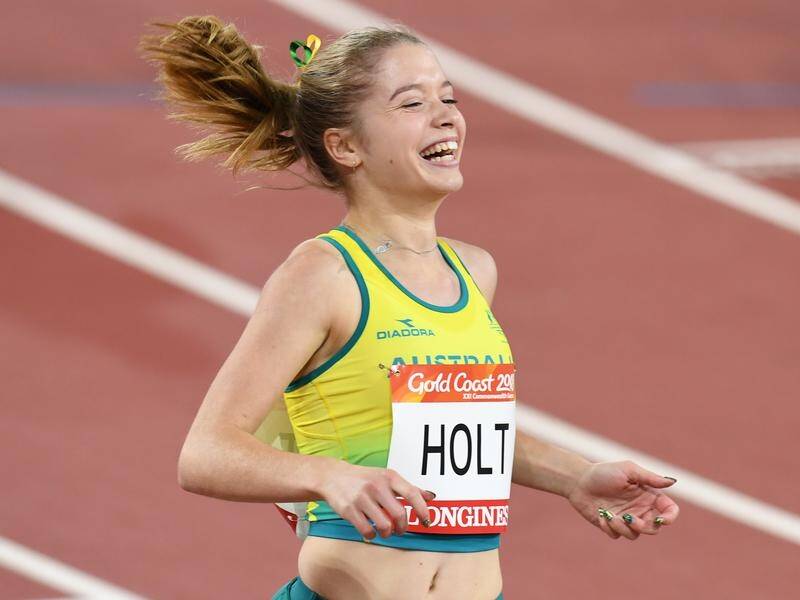 Isis Holt has won silver in the T35 100m, finishing a gallant second to China's Zhou Xia.