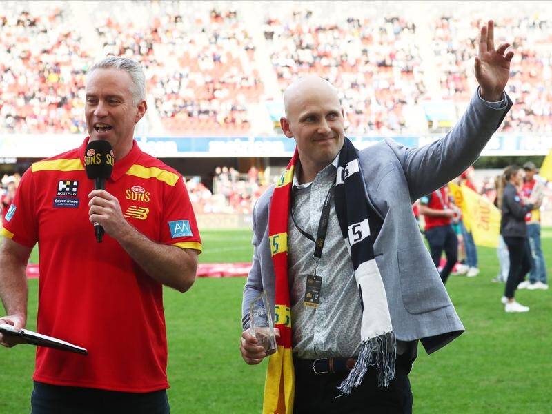 Former Gold Coast captain Gary Ablett (right) has been made a life member of the AFL club. (Jason O'BRIEN/AAP PHOTOS)