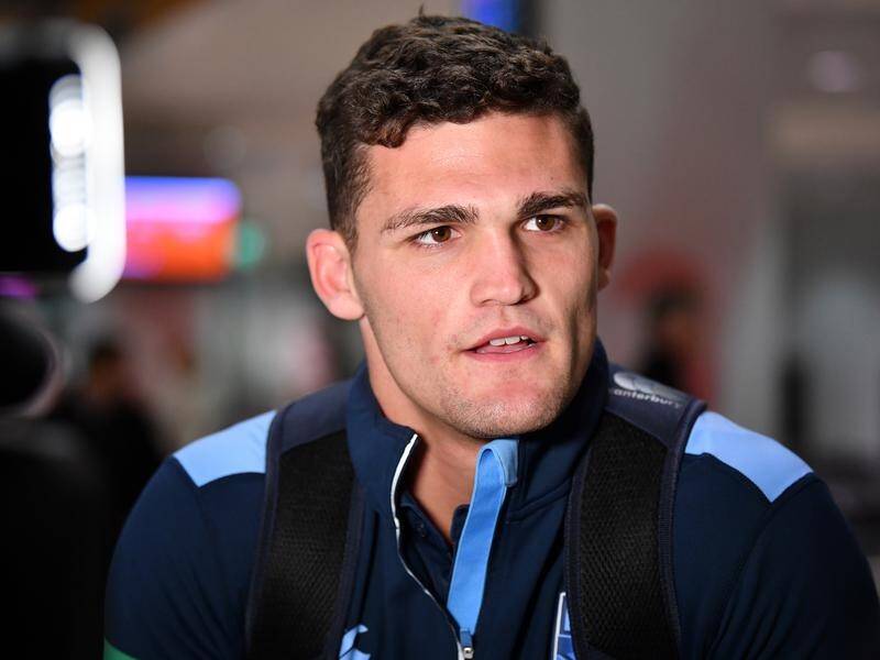 NSW's Nathan Cleary returned to Sydney on Monday on crutches and wearing a moon boot.