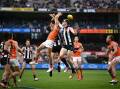 Collingwood have survived a late surge from GWS to secure an important 11-point AFL win at the MCG.