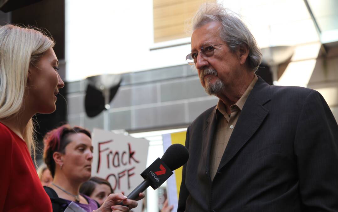 SPEAKING OUT: Well known actor Michael Caton will be speaking at a CSG forum in Forster on Saturday.  He is pictured here addressing the media at a protest outside AGL’s Sydney offices last month. 