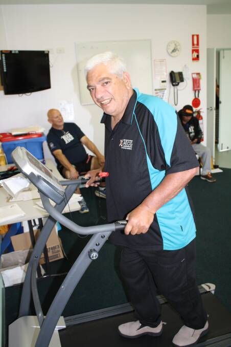 KEEPING FIT: Vince Hall takes part in the cardiac rehabilitation program which was recently introduced at Tobwabba Aboriginal Medical 
Centre in Forster. 