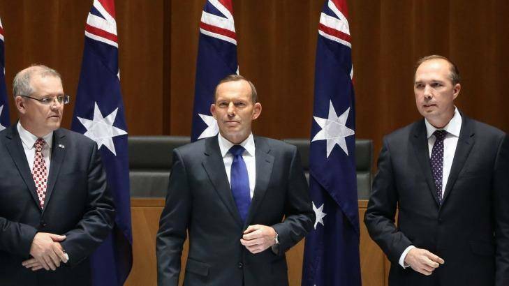 JOKE UNDER FIRE: Peter Dutton, right, with Tony Abbott and Scott Morrison. Photo: Alex Ellinghausen