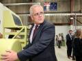 Prime Minister Scott Morrison at Air Affairs Australia's advanced manufacturing centre in South Nowra. The government has been caught wasting millions in grants to marginal seats - but shows no sign of stopping. Picture: James Croucher
