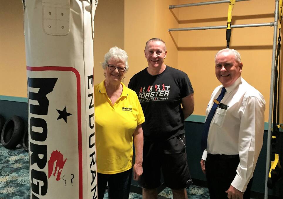 Confident kids: Forster Martial Arts and Fitness manager Colin Osborn, Club Forster president Claire Fletcher and Club Forster general manager Peter Clarke are making a stand against bullying.