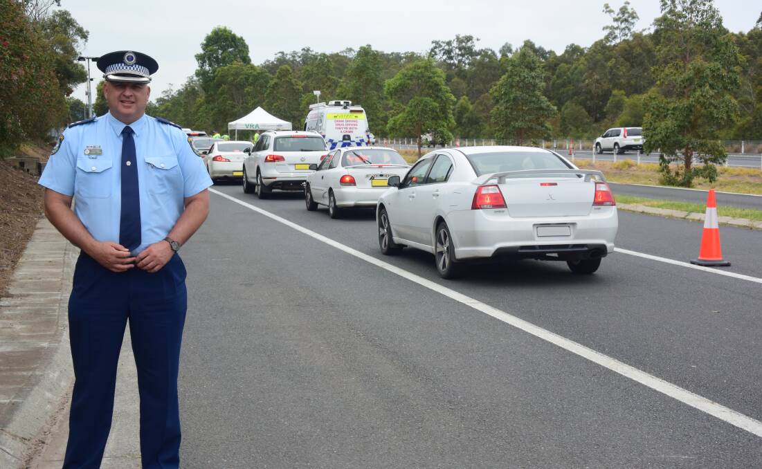 Testing: Manning Great Lakes Police District Commander Superintendent Shane Cribb at the traffic operation south of Taree. Image digitally altered. 