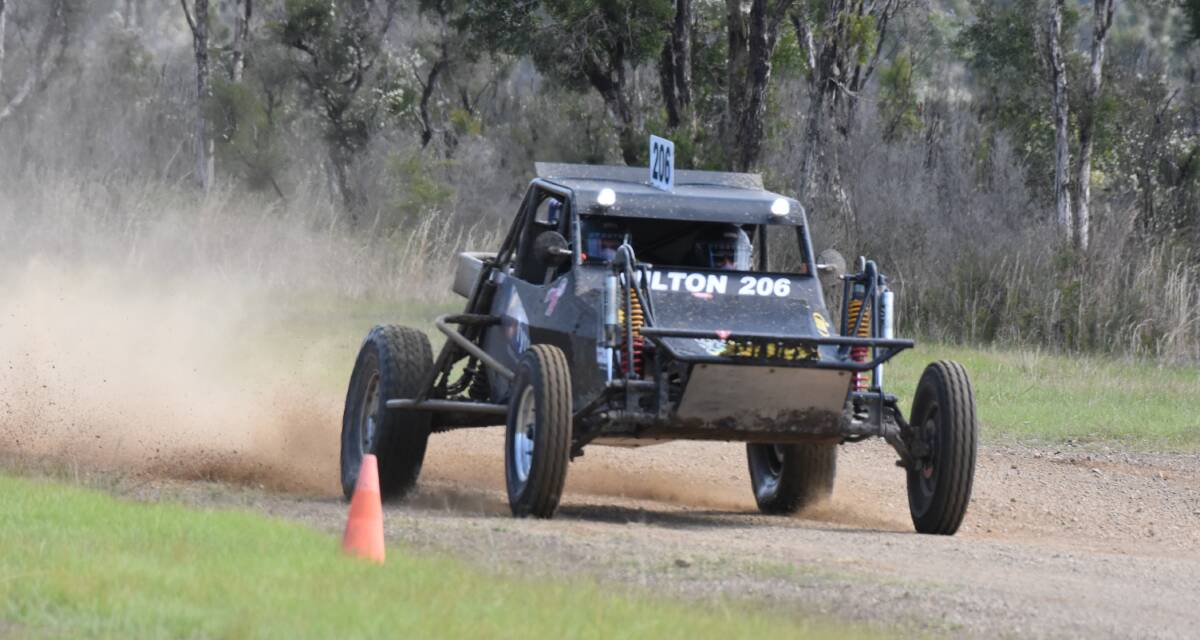Dust flying: Richard and Terese Wilton charge down the course during the first day of competition. The challenge will return to Nabiac in late 2019. Photo: Scott Calvin. 