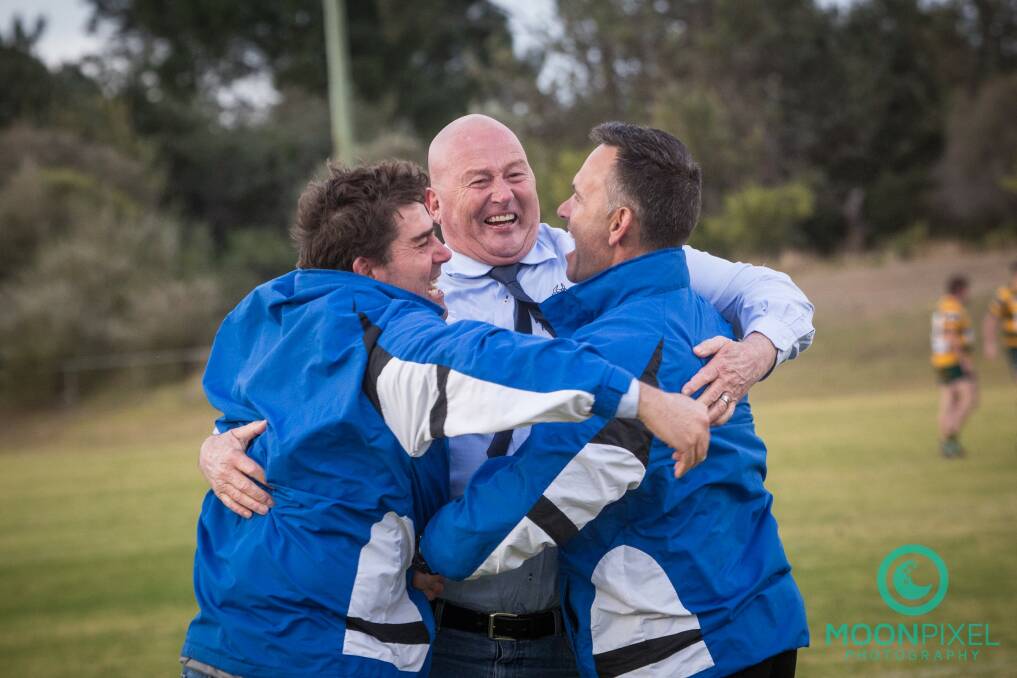 A picture tells a thousand words: Lee Sullivan, Arthur Chapman and Jim Wilson celebrate after Wallamba take out the Lower Mid North Coast Rugby Union premiership. Photo: Moon Pixel Photography.
