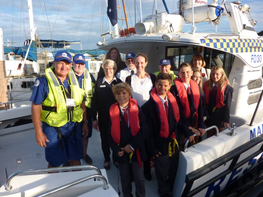 Skipper Don Wright, first skipper Anthony Breen, crew members Frances Breen and Keith Herdon, chaplin Milton Shaw, school councillors Camden Ceccato, Indiana Maher, Jack Duffy, Amber Simpson and Kye Wilkinson with staff members Mrs Susan Gonzales and Mrs Anne Evans aboard the Marine Rescue vessel.
