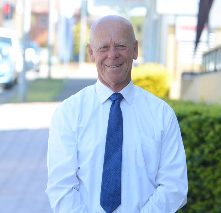 MidCoast Council mayor David West responded to Facebook criticism about his absence from Australia Day functions.