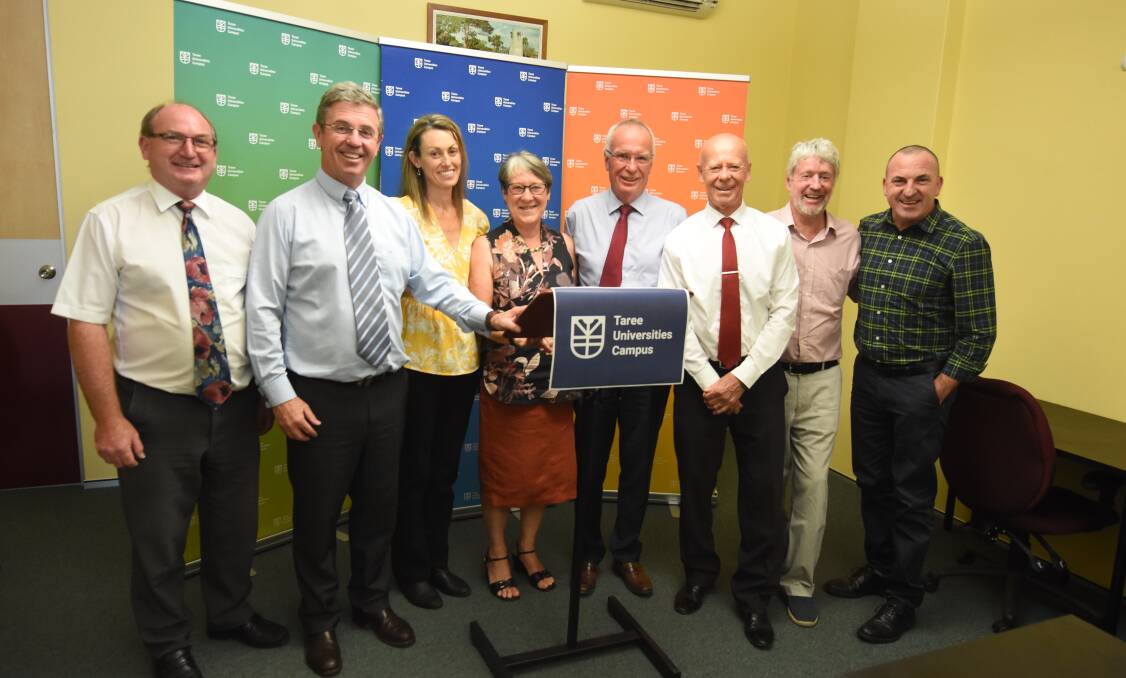 Appointed: TUC board members Maurie Stack, Dr John Howard, Lisa Proctor, Alison McIntosh, Steve Atkins and Graham Brown with Member for Lyne Dr David Gillespie and MidCoast Council mayor David West. 