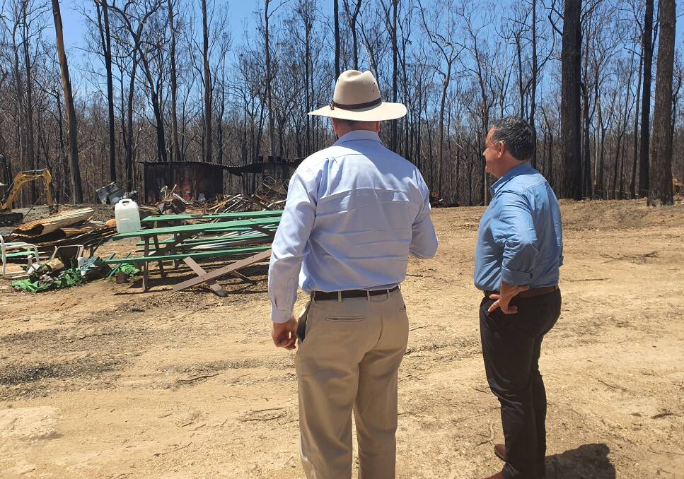 Member for Myall Lakes Stephen Bromhead and deputy premier John Barilaro survey bushfire damage.