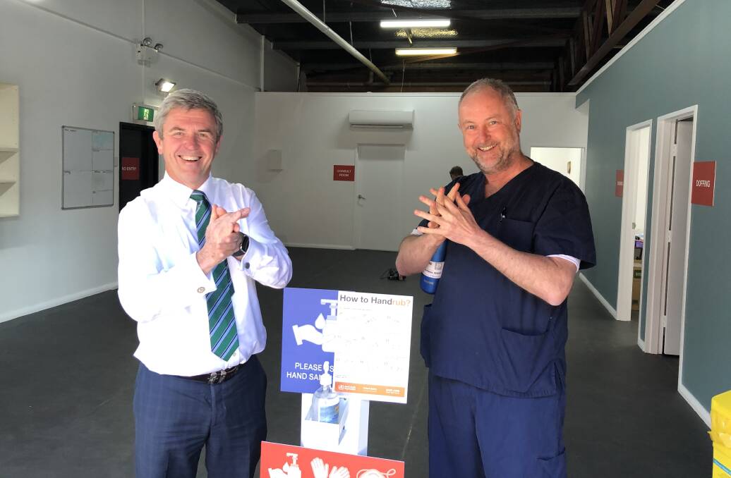 Clean pair of hands: Member for Lyne, David Gillespie with clinic manager, Simon Holliday.