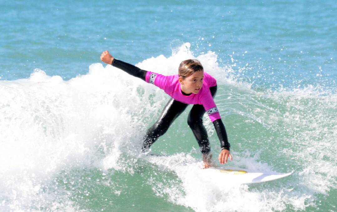 Next generation: Malakai Carson shows good form at Wallabi Point. The new Surfing NSW program aims to enhance the photography and film skills of young surfers. Photo: Scott Calvin.