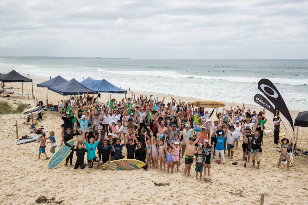 Dozens of surfers took to the water for the tag team surf competition. Photo: Something Visual. 