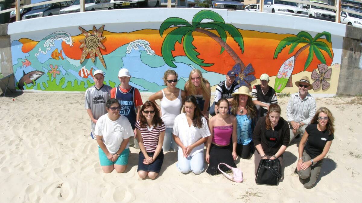 THROWBACK THURSDAY: the organisers and creators of the painted mural at Forster Main Beach. 