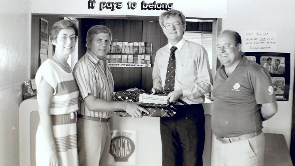THROWBACK THURSDAY: Winners of the NRMA Canada holiday contest, Kay and Ron Taaffe of Forster being presented with their tickets by district manager Lyndsey Sumerville and proprietor of the local NRMA Les Mugridge