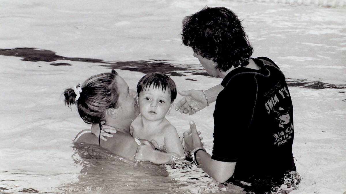 THROWBACK THURSDAY: Aaron Severs with mum Cindy learning how to swim with the help of instructor Jo Coleman.