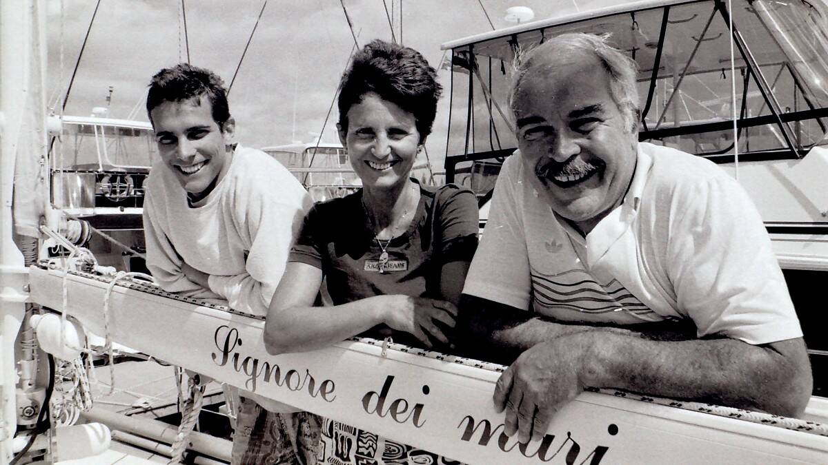 THROWBACK THURSDAY: Roberto Gianelli (far right), Delfino and Christian on board their Swiss yacht Signore dei mari in Forster boat harbour. 