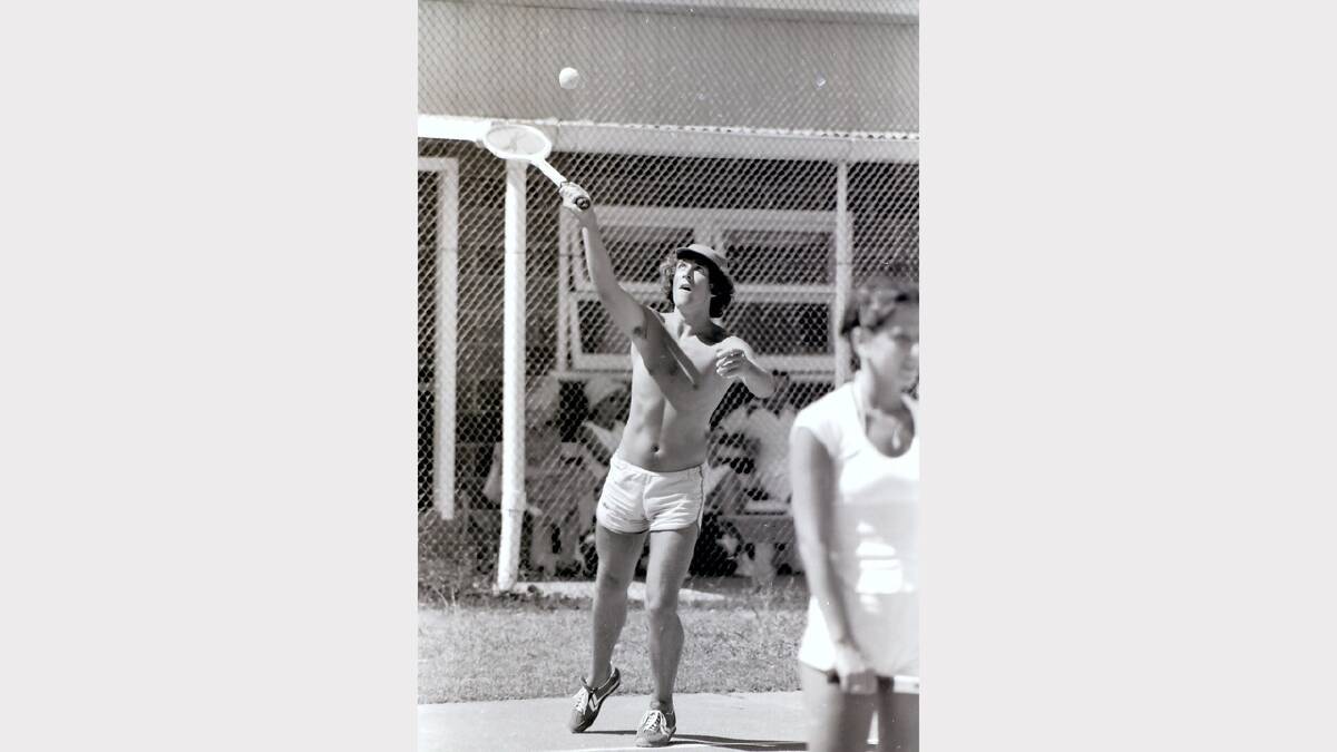 THROWBACK THURSDAY: Ray Robinson who resided in Dee Why at the time, serves during a game of social tennis at the Forster Courts. Photo from the February 15, 1979 edition.