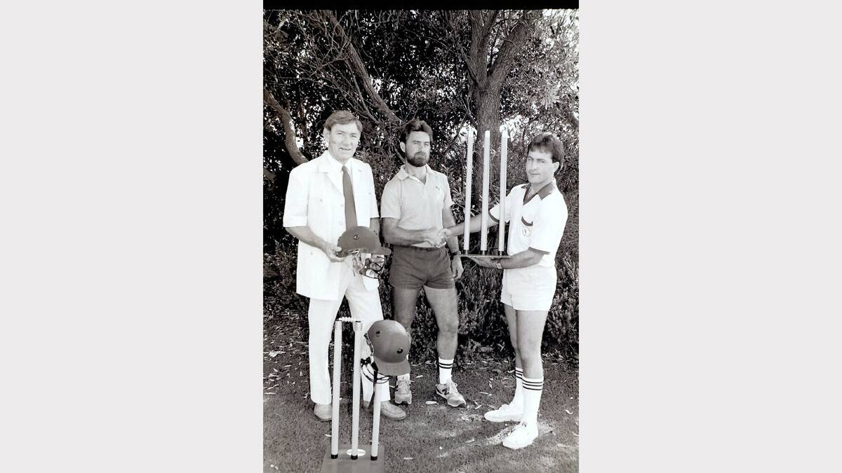 THROWBACK THURSDAY: Former Forster High principal Mal Richmond and Terry Wright were happy to receive a donation of sports equipments from Great Lakes Indoor Cricket Centre presented by Graham Hodson. 