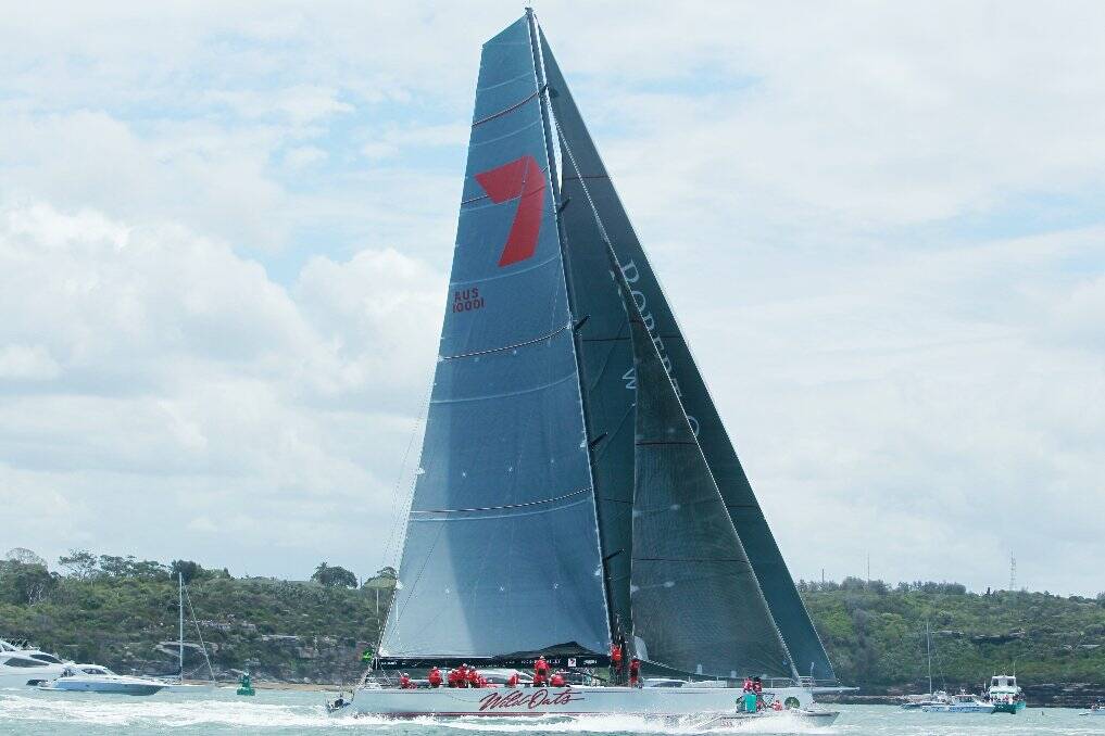 WHAT A LIFE: Rod Daniel (inset) helped pilot Wild Oats XI to a record-breaking line honours victory in the Sydney to Hobart Yacht Race. Main photo: James Brickwood.